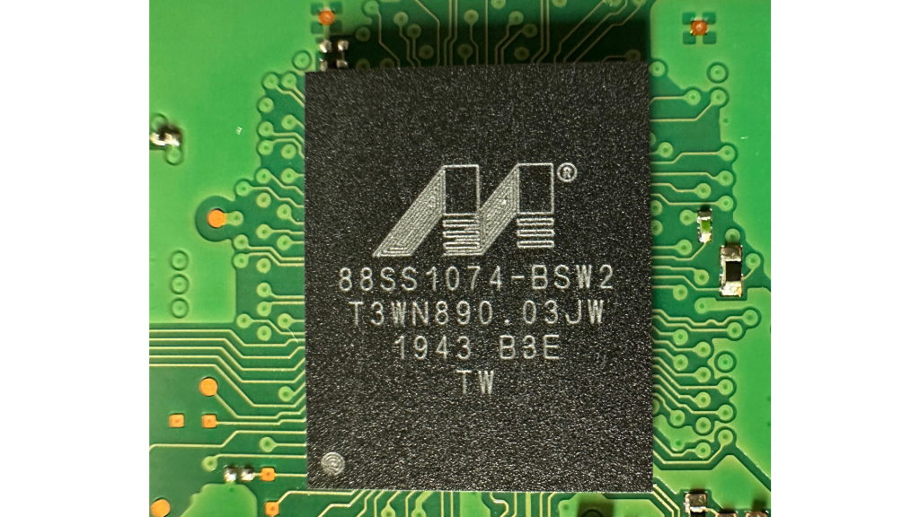 Marvell 88SS1074-BSW2 Controller Silicon Macro Photography on Micron 5210 ION PCB